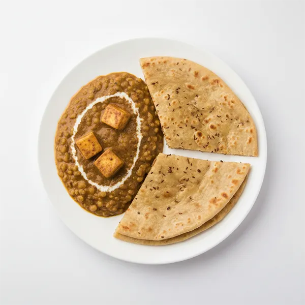 Dal and paneer Maharani with carrom seed paratha